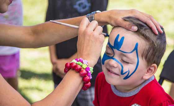 face painting and balloon twister